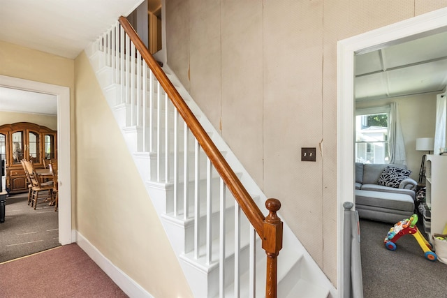90 Sullivan St, Claremont, NH 03743 - staircase featuring carpet flooring and baseboards