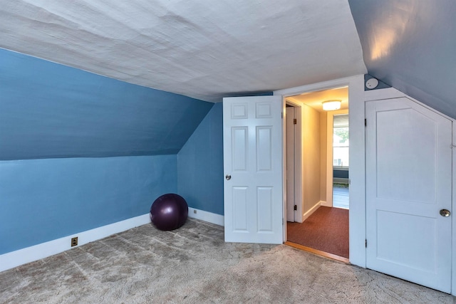 90 Sullivan St, Claremont, NH 03743 - bonus room with baseboards, carpet flooring, and vaulted ceiling