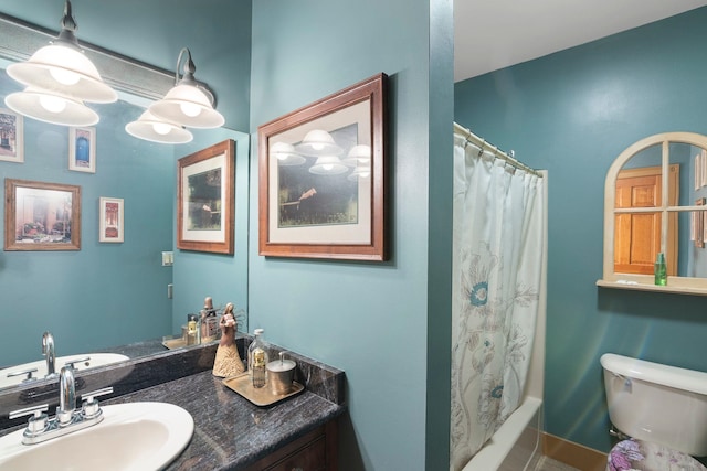 628 S Main St, Brattleboro, VT 05301 - bathroom featuring toilet, vanity, shower / bath combination with curtain, and baseboards