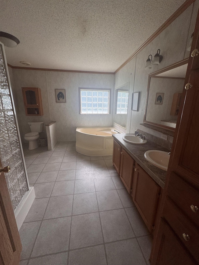 182 Franks Way, Middlesex, VT 05602 - bathroom with ornamental molding, a textured ceiling, a bath, double vanity, and tile patterned floors