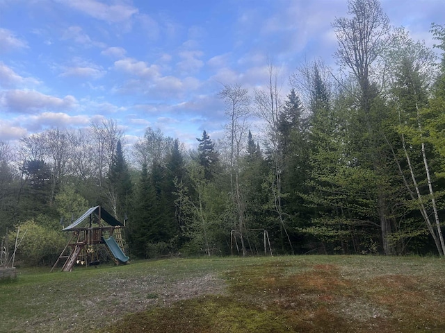 182 Franks Way, Middlesex, VT 05602 - view of yard with a playground and a view of trees