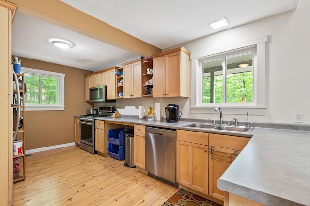 5 Adams Rd, Jackson, NH 03846 - kitchen featuring stainless steel appliances, a sink, light wood-style floors, and open shelves