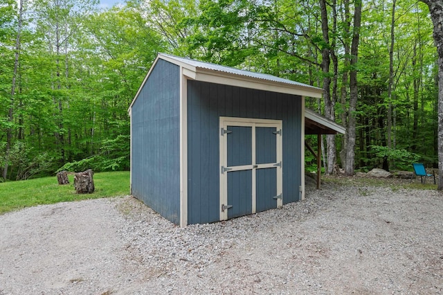 5 Adams Rd, Jackson, NH 03846 - view of shed with a view of trees