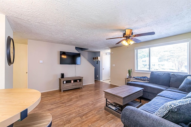 3 Cedarbrook Ave Unit C, Rochester, NH 03867 - living room with wood finished floors, ceiling fan, a textured ceiling, and baseboards