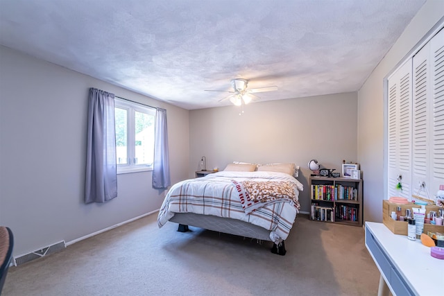 3 Cedarbrook Ave Unit C, Rochester, NH 03867 - bedroom with carpet floors, a closet, a ceiling fan, baseboards, and a textured ceiling