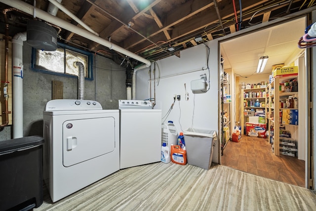 22 Westray Dr, Nashua, NH 03062 - laundry area featuring washing machine and dryer and wood finished floors