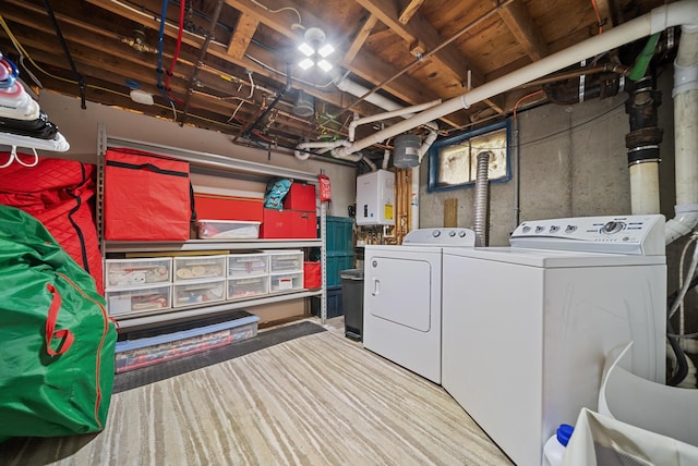 22 Westray Dr, Nashua, NH 03062 - laundry room with washing machine and clothes dryer and tankless water heater