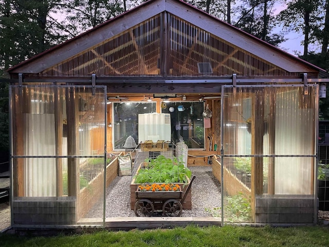 22 Westray Dr, Nashua, NH 03062 - view of outdoor structure with a vegetable garden