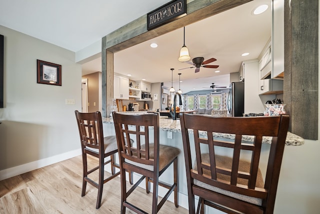 22 Westray Dr, Nashua, NH 03062 - dining space featuring a ceiling fan, light wood-style flooring, recessed lighting, and baseboards