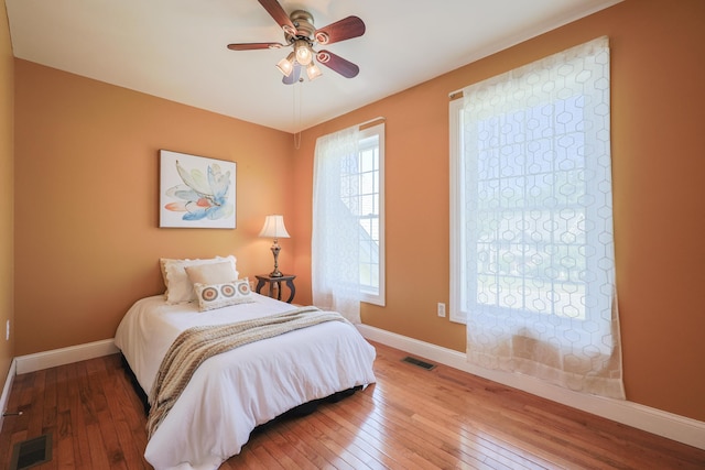 7 Adella Dr, Nashua, NH 03063 - bedroom with hardwood / wood-style flooring, baseboards, and ceiling fan