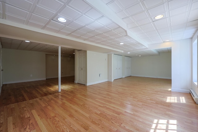 7 Adella Dr, Nashua, NH 03063 - finished basement featuring baseboards, light wood-type flooring, and recessed lighting