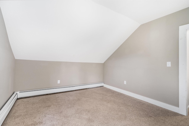 9 Grove Rd, Lyndeborough, NH 03082 - bonus room with carpet, lofted ceiling, and a baseboard heating unit