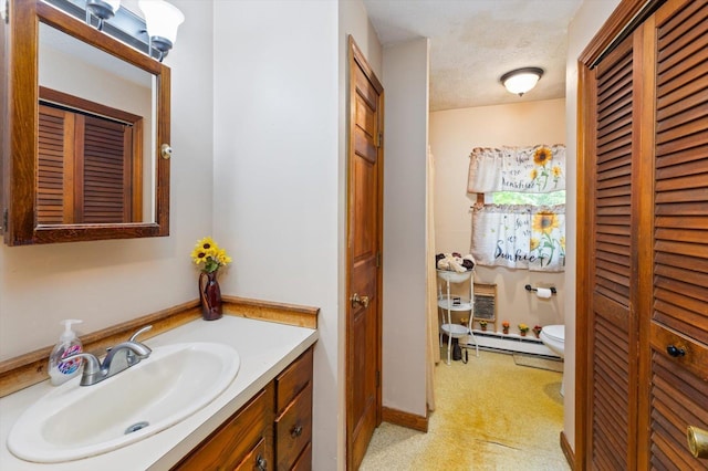 780 Greenfield Rd, Peterborough, NH 03458 - full bathroom with a closet, toilet, vanity, and a textured ceiling