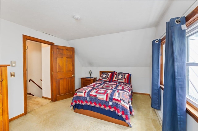 780 Greenfield Rd, Peterborough, NH 03458 - bedroom with carpet flooring, vaulted ceiling, and baseboards