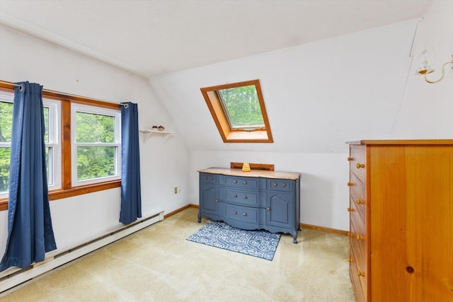 780 Greenfield Rd, Peterborough, NH 03458 - bedroom with a skylight, baseboard heating, lofted ceiling, baseboards, and light colored carpet