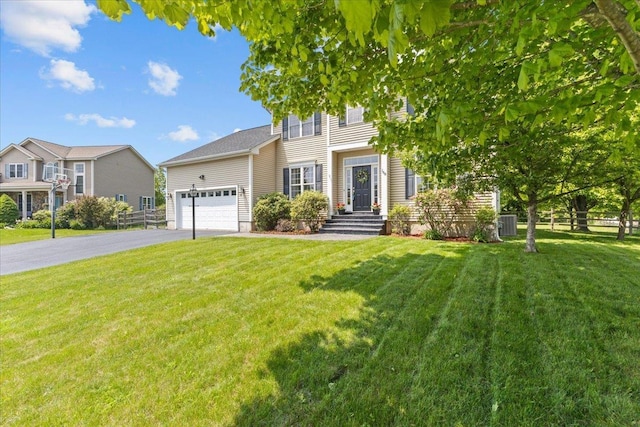 168 Raven Cir, Williston, VT 05495 - colonial inspired home with asphalt driveway and an attached garage