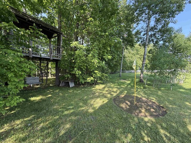 168 Raven Cir, Williston, VT 05495 - view of grassy yard featuring a wooden deck