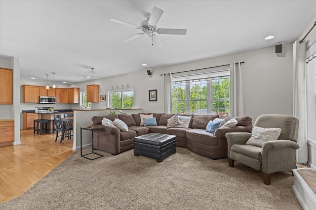168 Raven Cir, Williston, VT 05495 - living room with recessed lighting, ceiling fan, and light wood-style floors