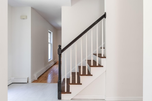 179 Arbor Ln, Colchester, VT 05446 - stairway with baseboard heating and baseboards