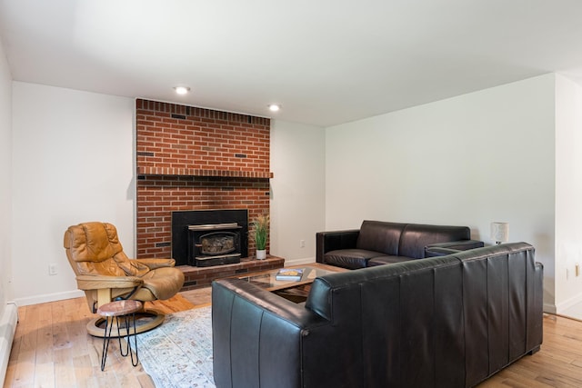 179 Arbor Ln, Colchester, VT 05446 - living room with hardwood / wood-style floors, baseboards, recessed lighting, and a baseboard radiator