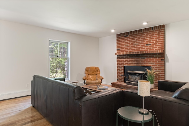 179 Arbor Ln, Colchester, VT 05446 - living area featuring light wood-style floors, baseboards, baseboard heating, and recessed lighting