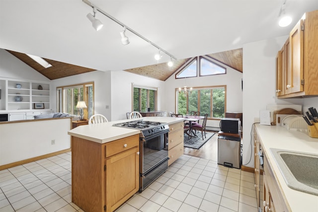 263 Old Post Rd, Newbury, NH 03255 - kitchen featuring black gas stove, track lighting, light countertops, a kitchen island, and a sink