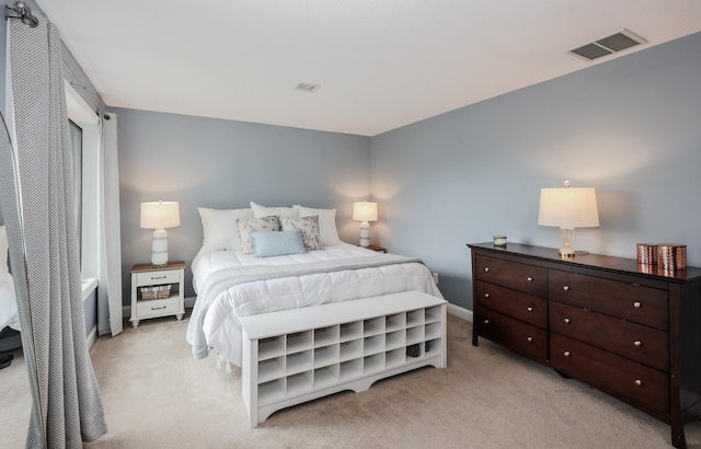 65 Victoria St Unit 8, Manchester, NH 03104 - bedroom featuring light carpet and baseboards
