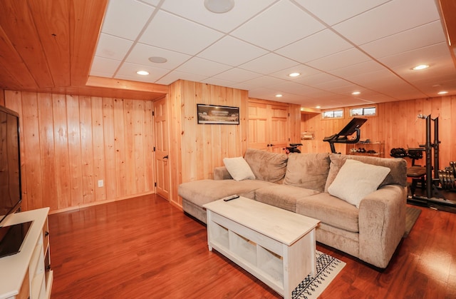 65 Victoria St Unit 8, Manchester, NH 03104 - living room featuring wood finished floors, wooden walls, and recessed lighting