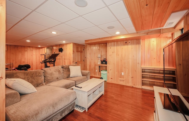 65 Victoria St Unit 8, Manchester, NH 03104 - living area featuring wooden walls, wood finished floors, and recessed lighting