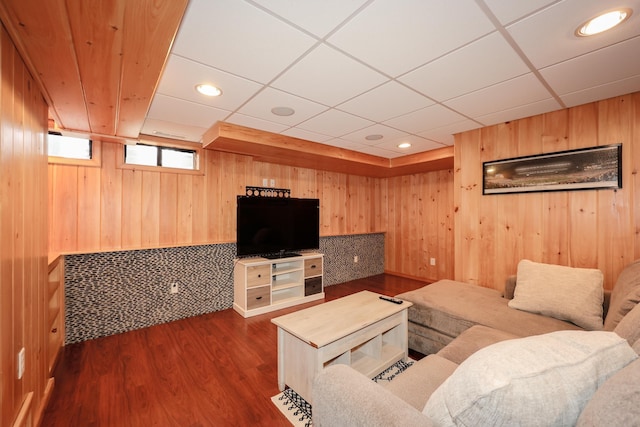 65 Victoria St Unit 8, Manchester, NH 03104 - living room with wood walls, dark wood-type flooring, a drop ceiling, and recessed lighting