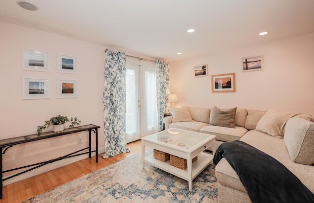 65 Victoria St Unit 8, Manchester, NH 03104 - living area with wood finished floors and recessed lighting