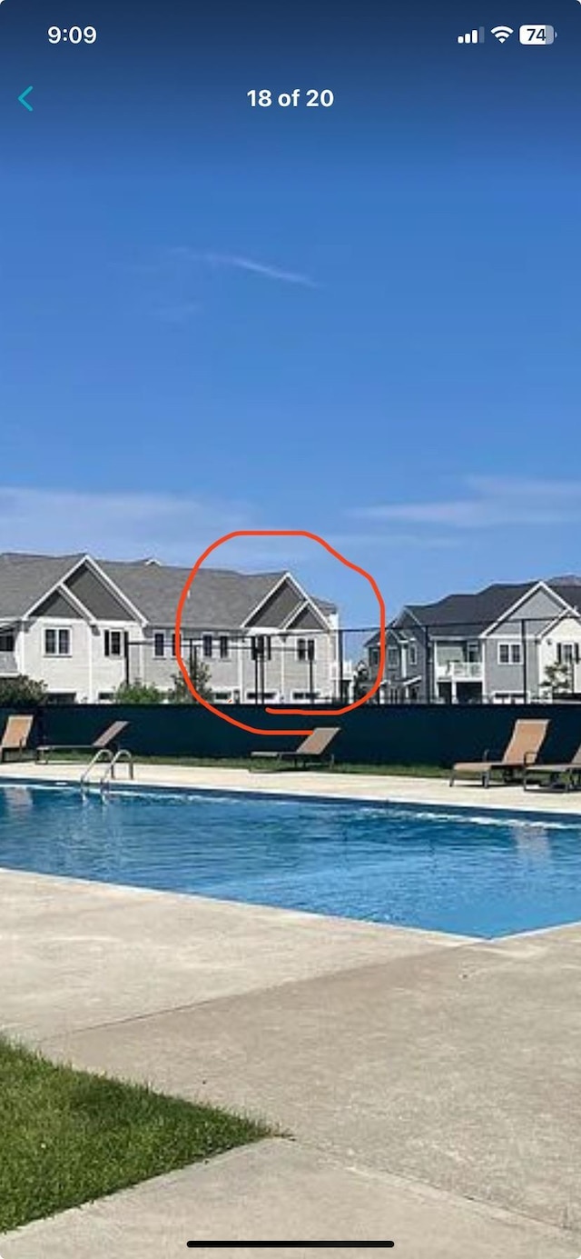 127 Holland Ln Unit 6, Williston, VT 05495 - swimming pool featuring a residential view