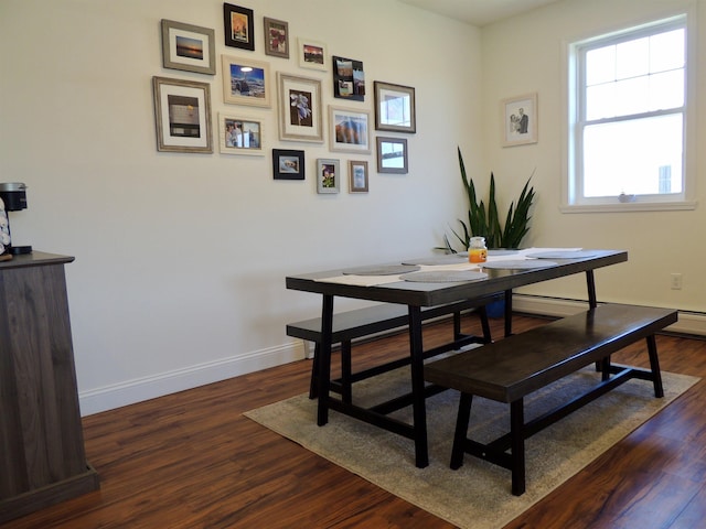 127 Holland Ln Unit 6, Williston, VT 05495 - dining room featuring baseboards and wood finished floors