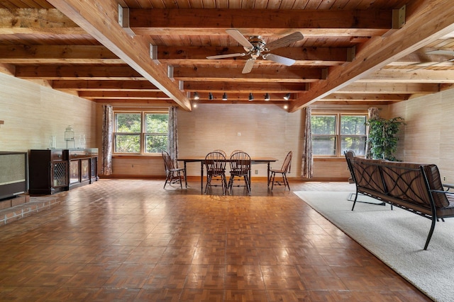 16 Mckinnon Rd, Washington, NH 03280 - dining space with wooden ceiling with exposed beams, plenty of natural light, and a ceiling fan