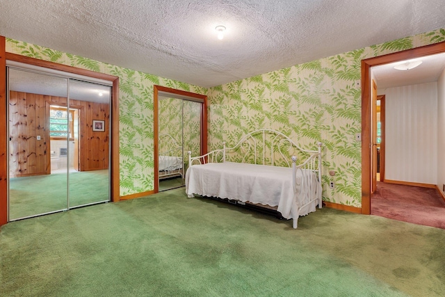 16 Mckinnon Rd, Washington, NH 03280 - carpeted bedroom with wallpapered walls, a textured ceiling, and baseboards