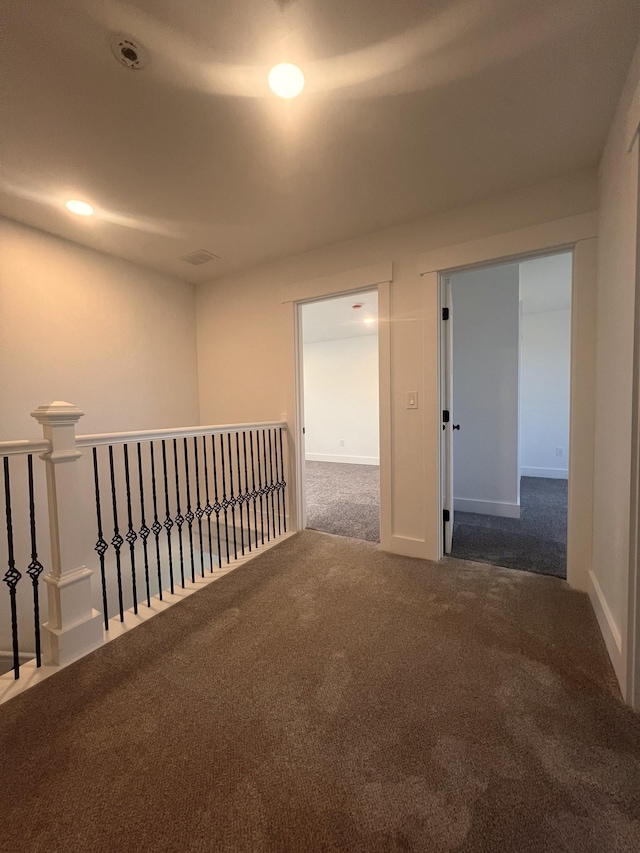 3 Crocket St, Rochester, NH 03867 - carpeted empty room with recessed lighting and baseboards