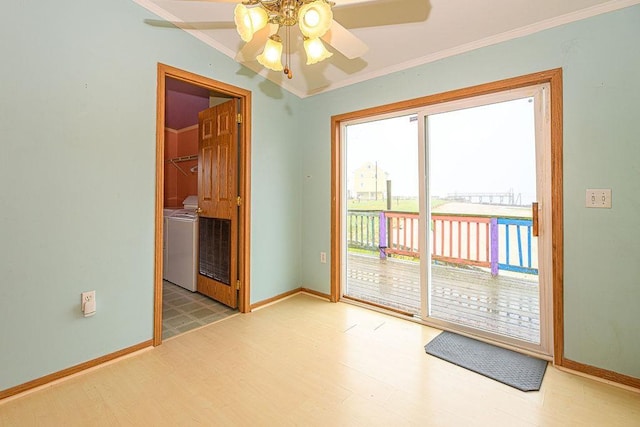 19/22 River St, Seabrook, NH 03874 - unfurnished room with crown molding, wood finished floors, a ceiling fan, baseboards, and independent washer and dryer