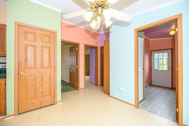19/22 River St, Seabrook, NH 03874 - empty room featuring ceiling fan, crown molding, wood finished floors, and baseboards