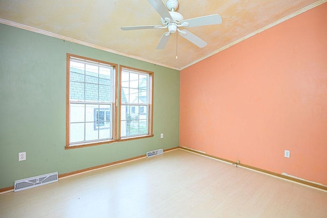 19/22 River St, Seabrook, NH 03874 - unfurnished room featuring wood finished floors, a ceiling fan, ornamental molding, and baseboards