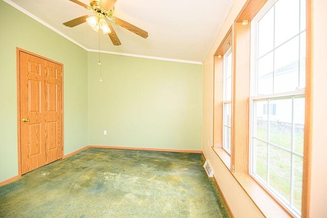 19/22 River St, Seabrook, NH 03874 - carpeted spare room featuring baseboards, crown molding, and a ceiling fan