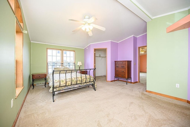 19/22 River St, Seabrook, NH 03874 - carpeted bedroom with ornamental molding, baseboards, lofted ceiling, a spacious closet, and ceiling fan