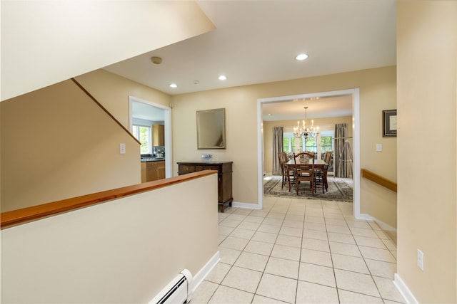 188 Foster Farm Rd, Stowe, VT 05672 - hall with a chandelier, recessed lighting, baseboards, and light tile patterned floors