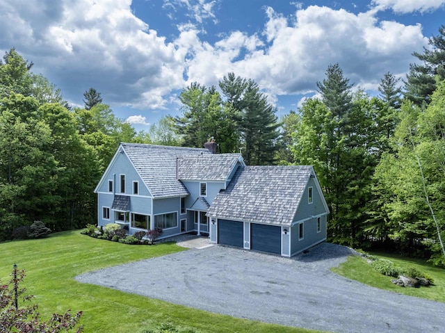 188 Foster Farm Rd, Stowe, VT 05672 - view of front of property with a chimney, a front yard, and driveway