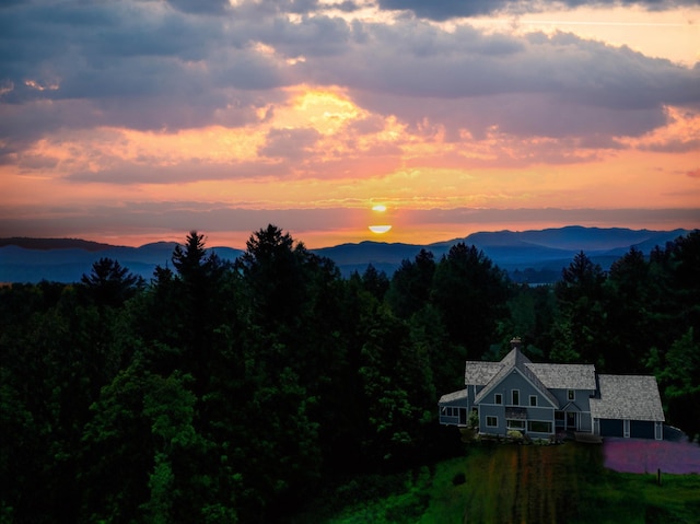 188 Foster Farm Rd, Stowe, VT 05672 - view of mountain background with a forest