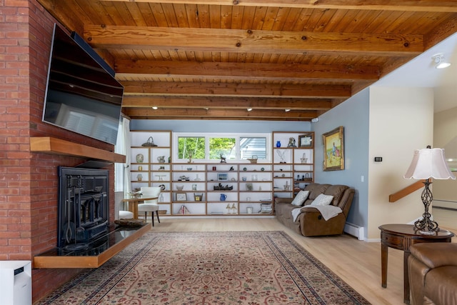 188 Foster Farm Rd, Stowe, VT 05672 - living room with a baseboard heating unit, wood finished floors, wood ceiling with exposed beams, a large fireplace, and baseboards