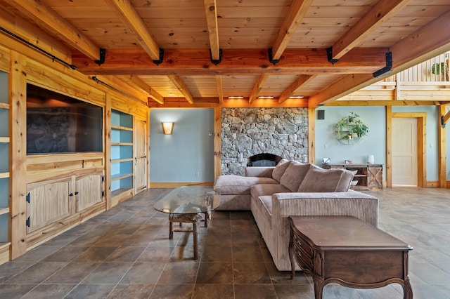 151 Brock Hill Rd, Bridgewater, NH 03222 - living area featuring wooden ceiling with exposed beams, a stone fireplace, and baseboards