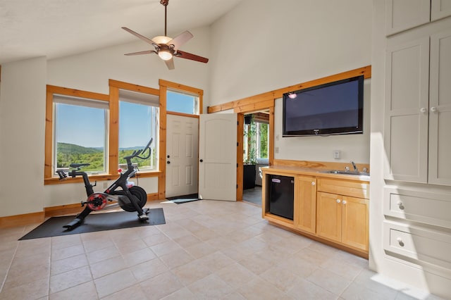 151 Brock Hill Rd, Bridgewater, NH 03222 - workout room with a ceiling fan, a sink, light tile patterned floors, and high vaulted ceiling