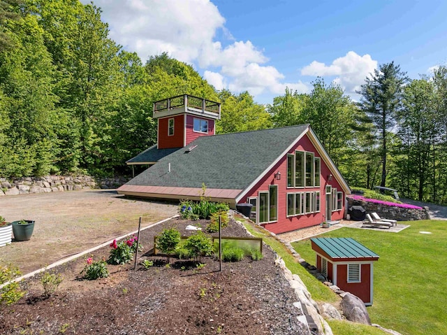 151 Brock Hill Rd, Bridgewater, NH 03222 - back of house featuring a lawn, a shingled roof, a wooden deck, and a balcony