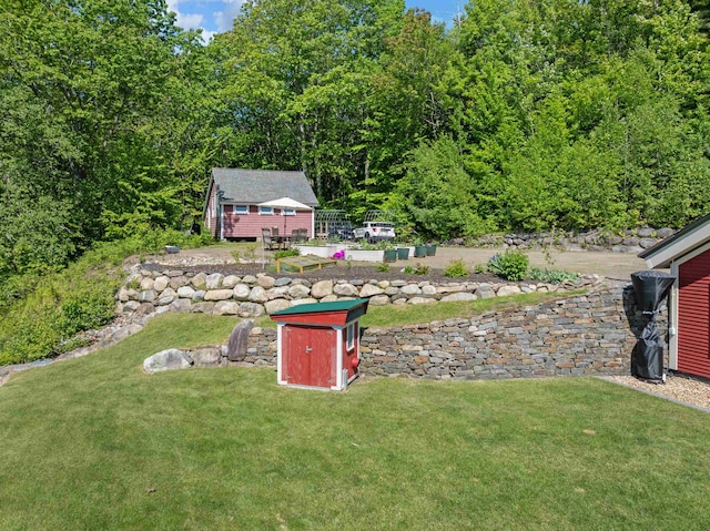 151 Brock Hill Rd, Bridgewater, NH 03222 - view of grassy yard featuring an outbuilding