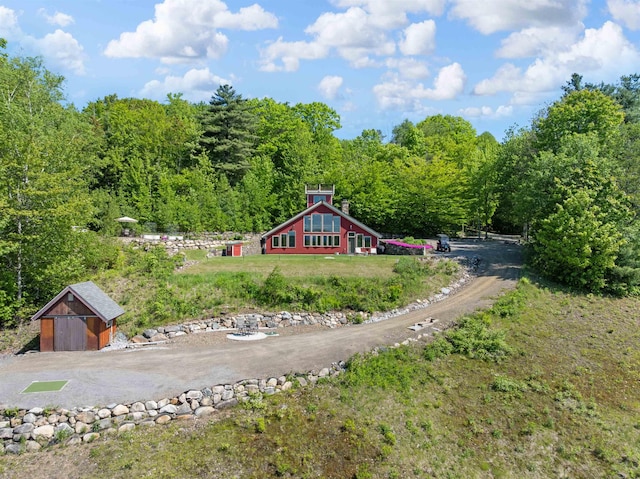 151 Brock Hill Rd, Bridgewater, NH 03222 - back of property with a view of trees